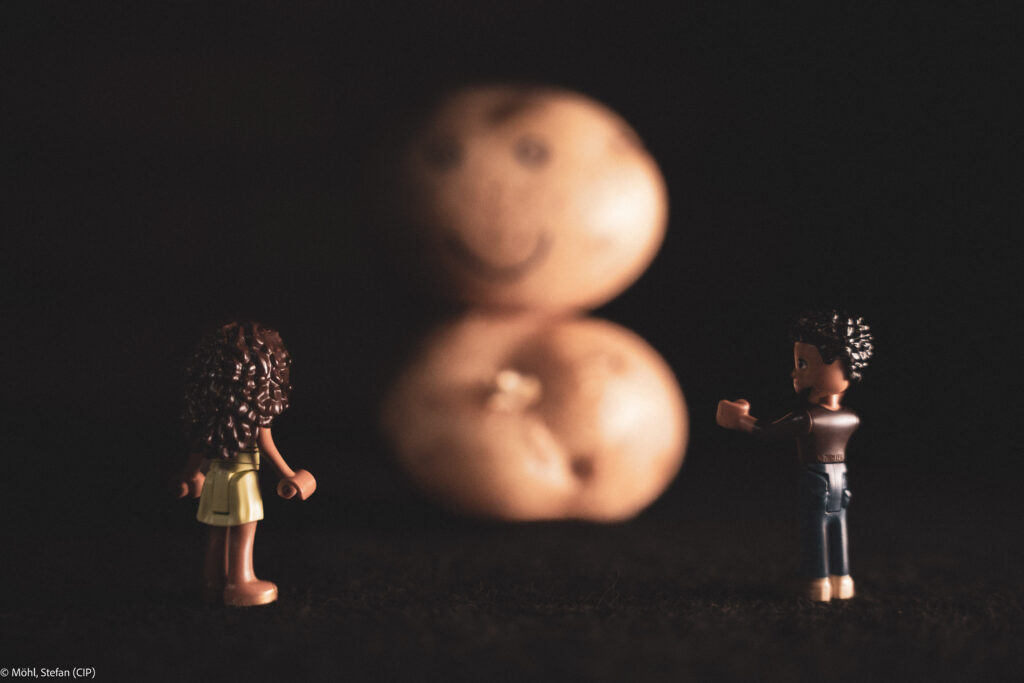 Image of two Lego figures of children looking with amazement at an RTB giant.